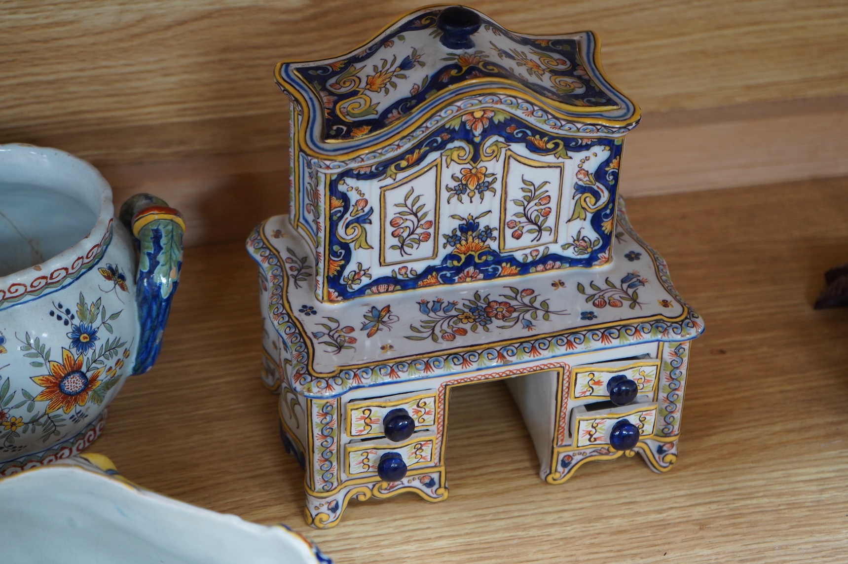 19th century French decorative faience including bag pipes, a large wall pocket, jardiniere etc (22).
